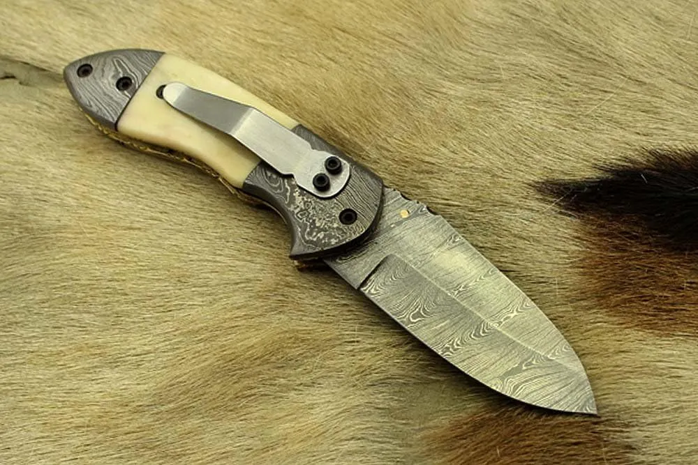 7 Inch Long Hand Forged Damascus Steel Folding Knife, Natural Bull Horn Scale with Damascus Bolster, Equipped with Liner Lock and Thumb knob, Cow Hide Leather Sheath
