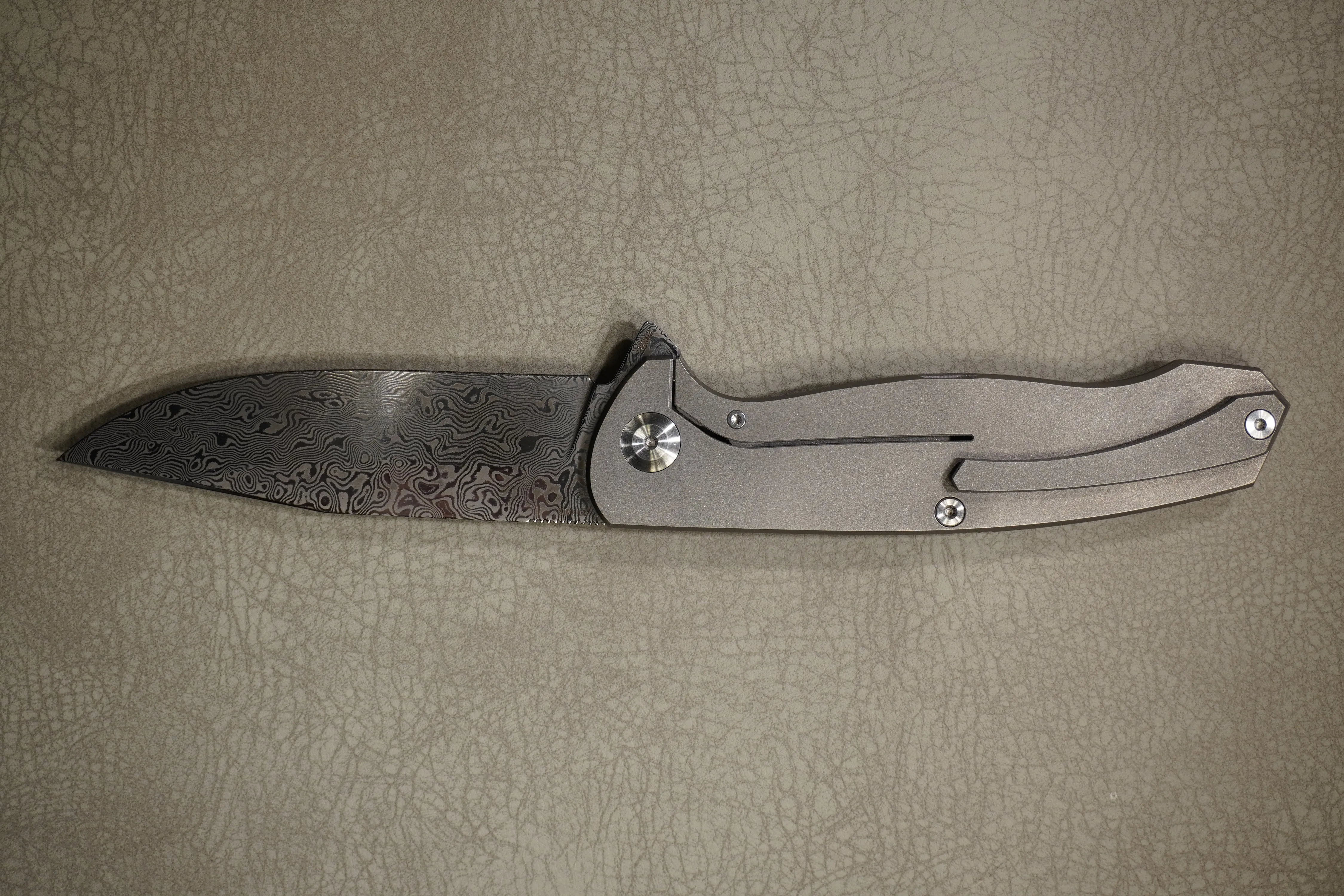 Cheburkov Knife Wolf with an Insert, Steel Damascus, Handle Marble Carbon, Gray Anodized Titanium
