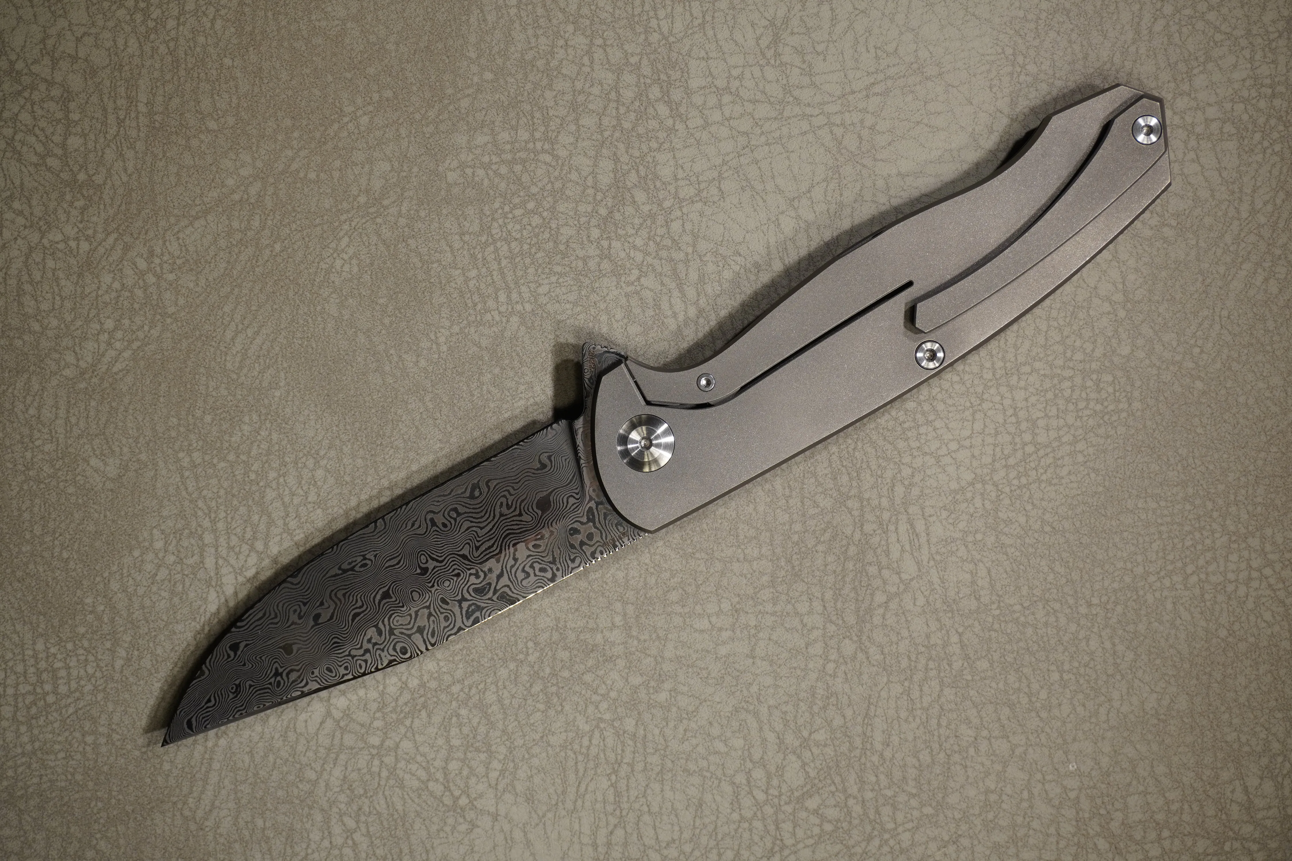 Cheburkov Knife Wolf with an Insert, Steel Damascus, Handle Marble Carbon, Gray Anodized Titanium