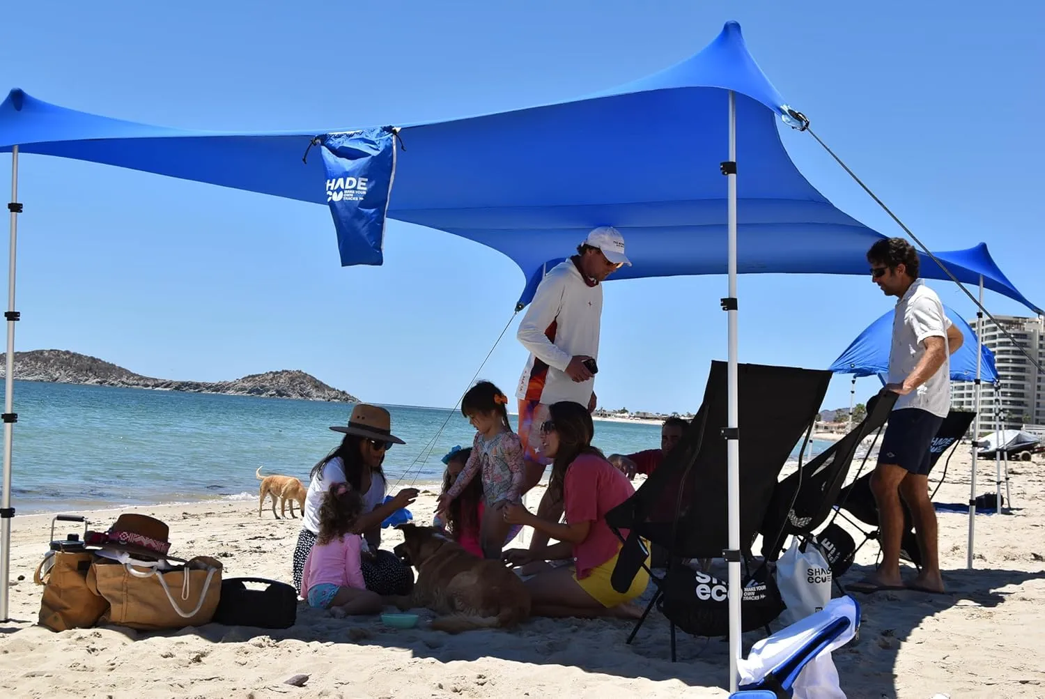 Nomad XL Beach Shade | 15x8.5 ft. Beach Tent Sun Shelter with UPF50  Protection, Adjustable Shade Tent | Quick 5-Min Setup, 25MPH Windproof, Light & Compact Grass & Sand | 4-Posts w/Dry Bag